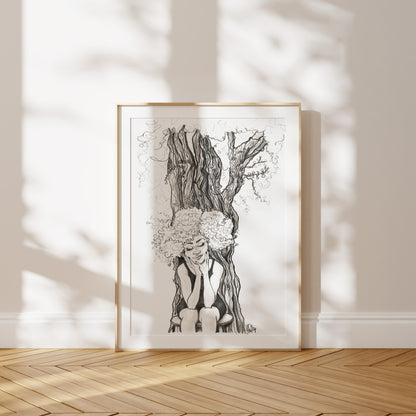 Framed black and white artwork of a woman from Burundi sitting in front of a fig tree on a wall with wooden floor and light shadows.