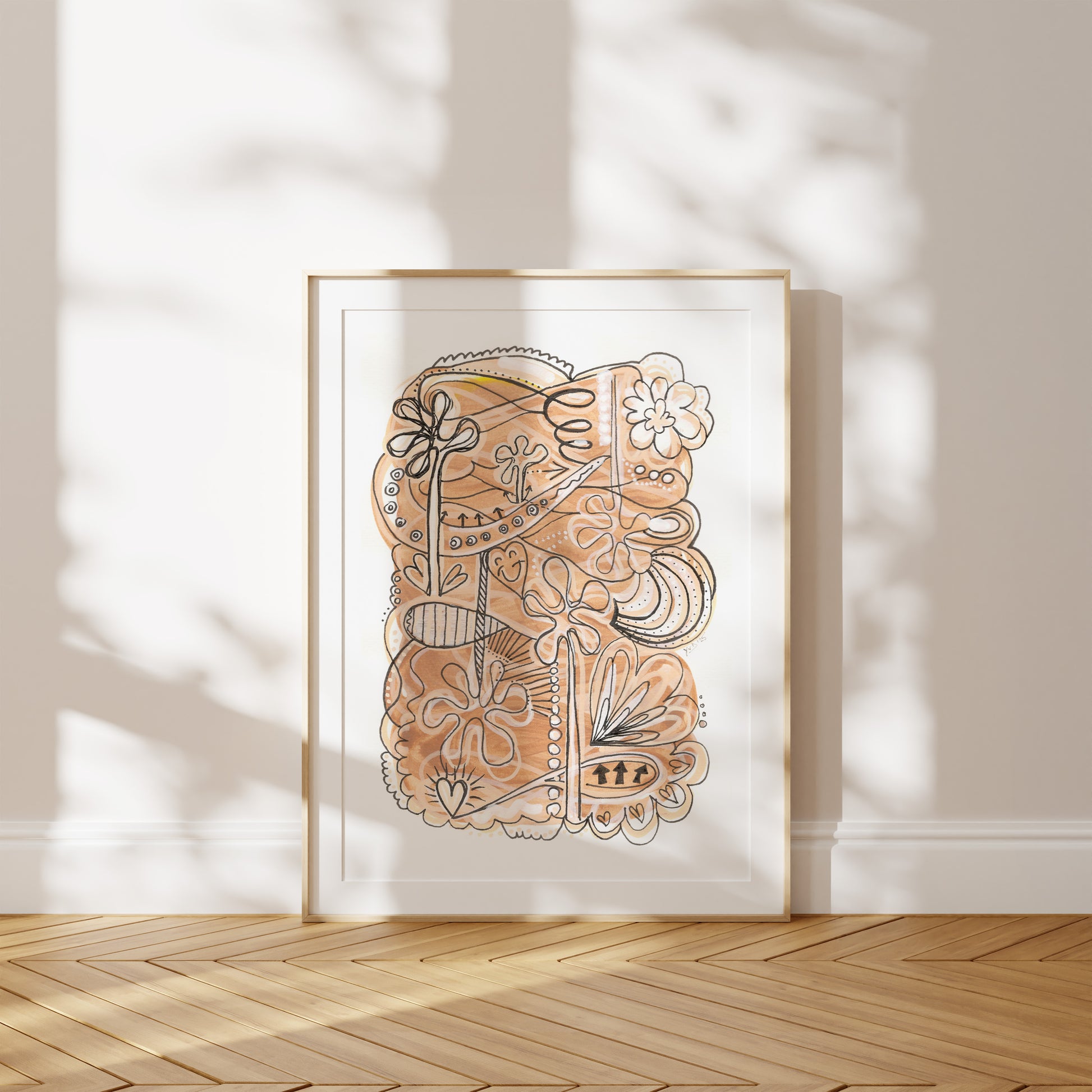 Framed abstract artwork on a wall with wooden floor and light shadows